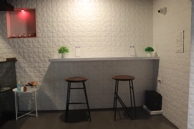 Window counter with tall wooden stools